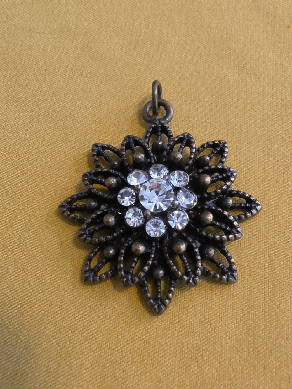 Vintage Filigree Designed Pendant in a Stylized Flower or Starburst Shape